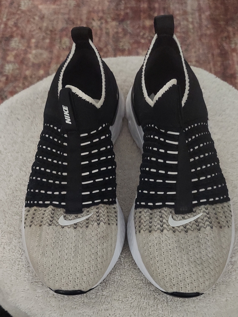 Nike React Phantom Women’s Black and Cream Knit Slip-On Athletic Sneakers